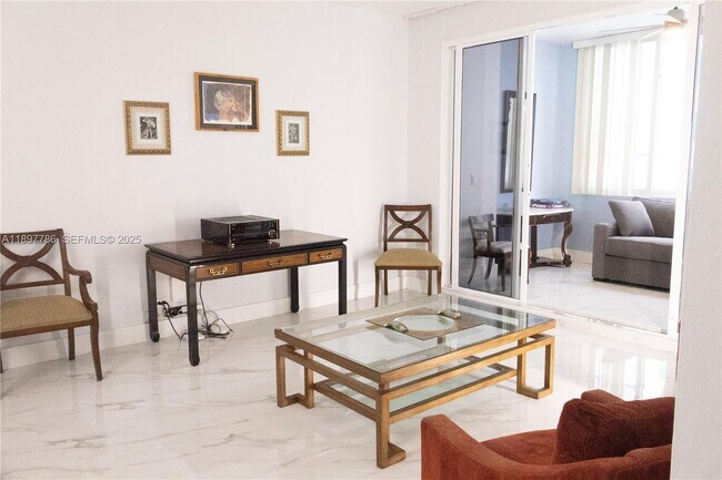 Building Photo - 5005 Collins Ave