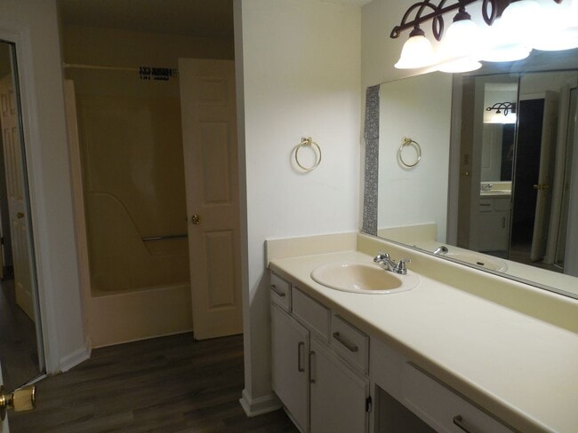 Building Photo - End Unit Condo Available now