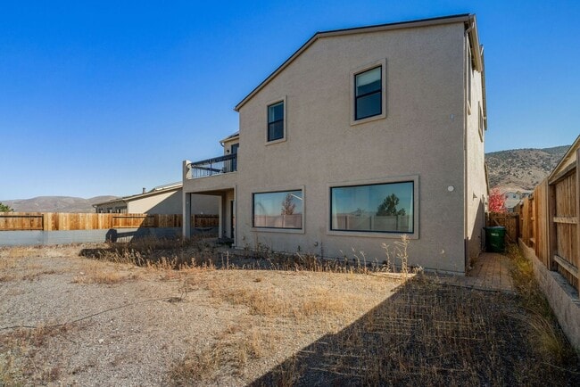 Building Photo - Beautiful 4BR/4BA home in the gated Copper View community. Features spacious living areas, mounta...