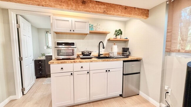 Building Photo - Darling Open Studio Layout Guest Home unit on Lush and Beautifully Landscaped Private Property in...