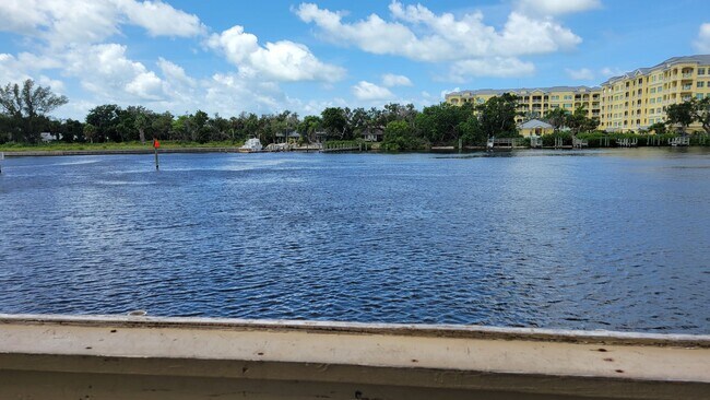 Building Photo - LEASE PENDING Annual/Seasonal turnkey furnished 2/2 end townhome in waterfront community by Siest...