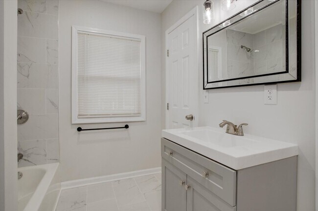 Building Photo - Move fast on this one. Apply within 24 hours of your showing and lock in $250 off your monthly re...