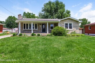 Building Photo - 8003 Canna Dr