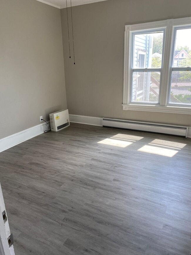 Building Photo - 1110-1112-1112 N Rock St