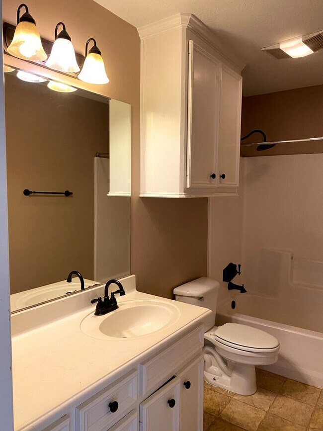 Building Photo - FABULOUS THREE BEDROOM HOME WITH LARGE DECK, FIREPLACE AND FLEX ROOM