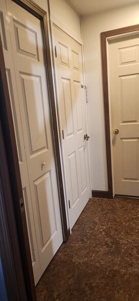 Doorway to understair storage, upstairs and bedroom - 2116 Thaler Ave