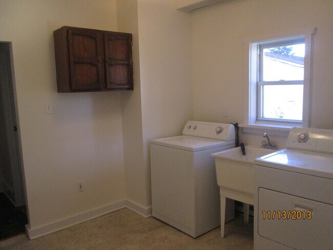 Laundry hookup in rear off porch - 513 6th Ave