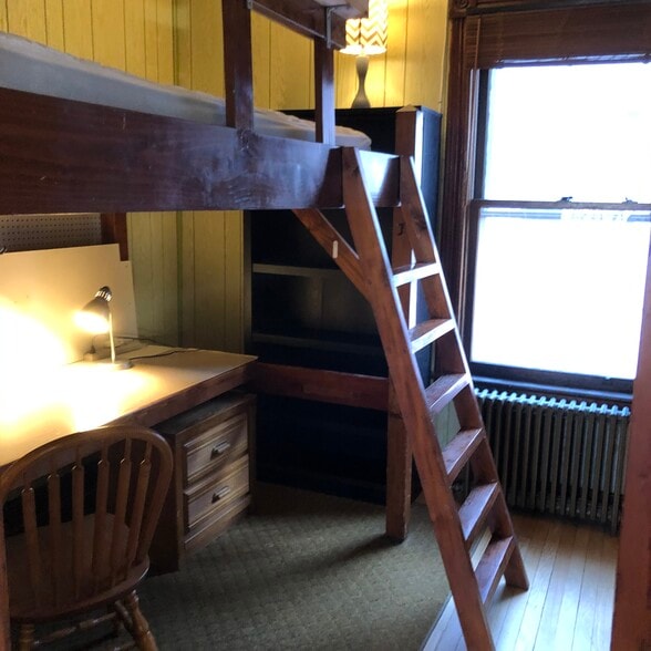 Furnished Bedroom w/ loft bed - 240 11th St