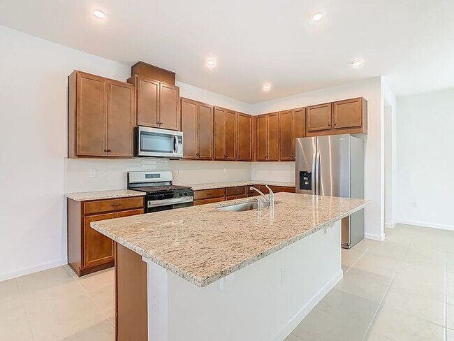 Building Photo - New Luxury Townhome in Celebration, FL Corner unit. All porcelain tiled floors. Aleutian model by...