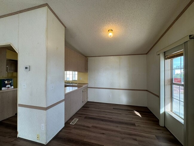 Building Photo - Sunrise Vista -2 Br, 2Ba home with covered carport, fenced yard, storage