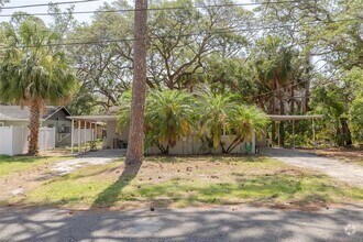 Building Photo - 7116-7120 Oakwood Dr