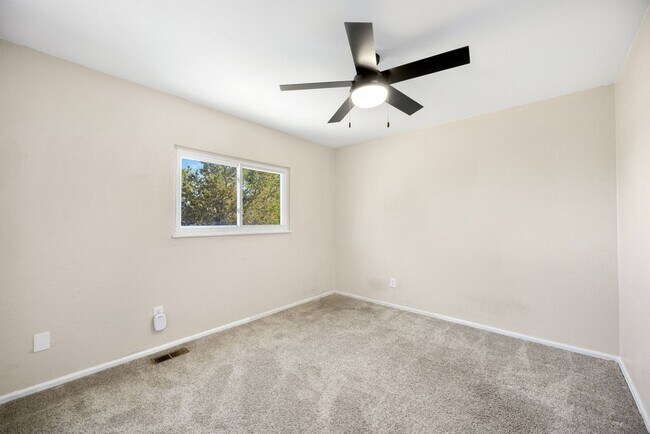 Building Photo - Spacious 3-Bedroom Home with 4th bedroom on lower level & Attached Garage