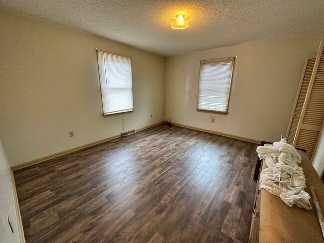 Building Photo - 4-Bedroom Brick Home with Full Unfinished ...
