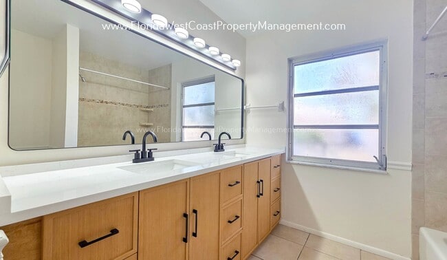 Building Photo - SPACIOUS SARASOTA HOME WITH LARGE FENCED YARD! MOVE IN READY! ALL TILE/ NEW LVP!