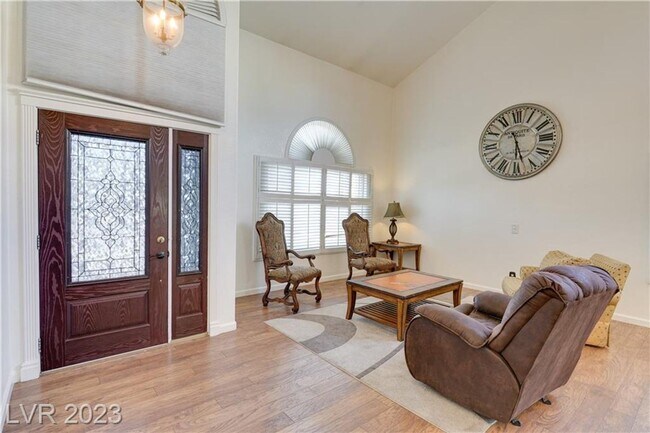 Building Photo - 4 BEDROOM HOME WITH PRIMARY BEDROOM DOWNST...