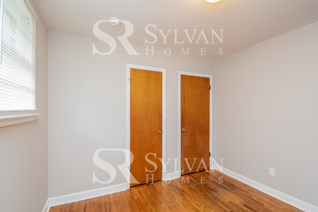 Building Photo - Welcome to this charming abode.