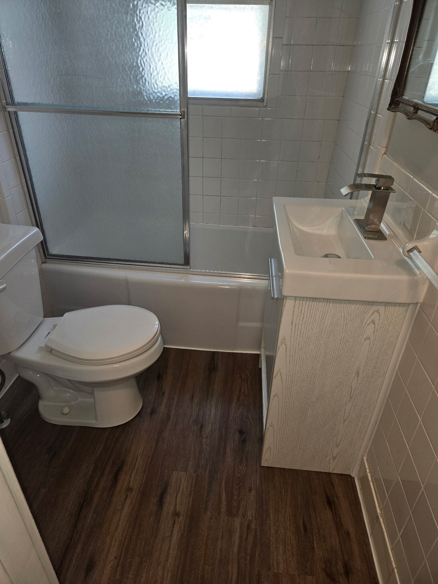 New upstairs bathroom vanity and flooring - 1114 N Carlos St