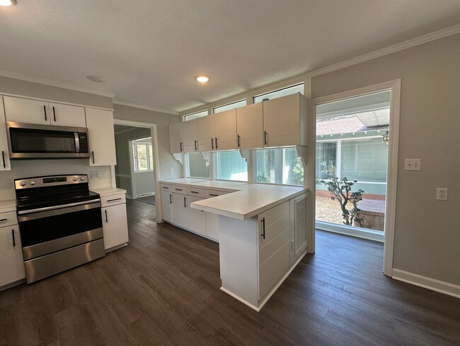 Building Photo - Fully Renovated Home with Unmatched Character