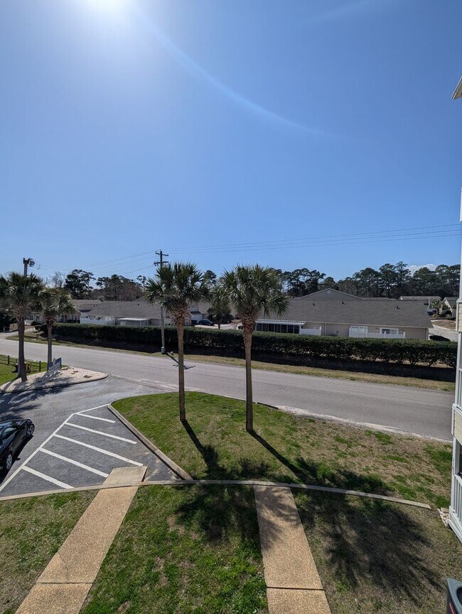 Building Photo - Dreamy Little River Condo — Furnished, Elevator Access, Pool & Marina Nearby!