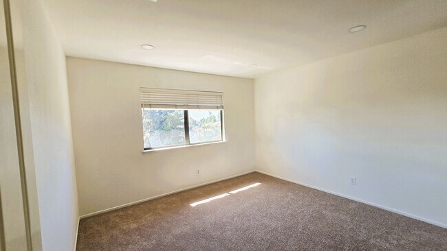 Building Photo - "Spacious, Sunlit Home in a Peaceful Ranch...