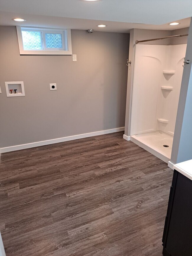 Building Photo - District 66 - 4/2/1 fenced backyard