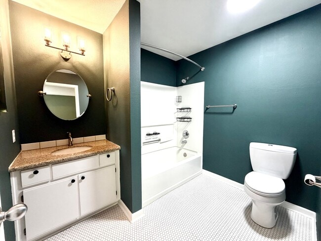 Building Photo - Updated 2BD/2BA Condo with Green Space Views & Covered Parking