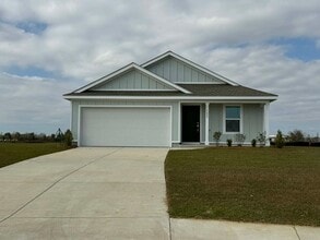 Building Photo - Four Bedroom/Two Bath - Summerdale