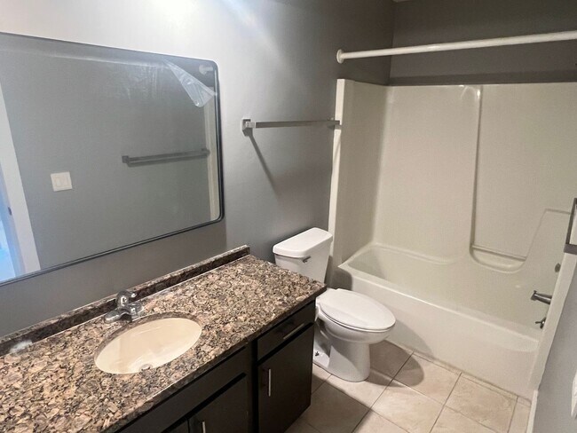 Building Photo - Updated Condo with Water view - Available ...