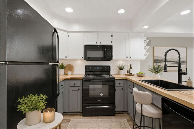 Building Photo - Unbeatable Value! Beautifully Updated 2BR/1.5BA Top-Floor Oasis in the Heart of Olney – Literally...
