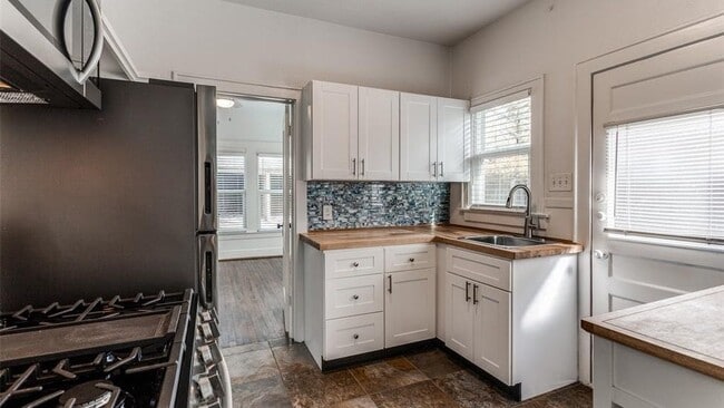 Building Photo - 6349 Belmont Ave