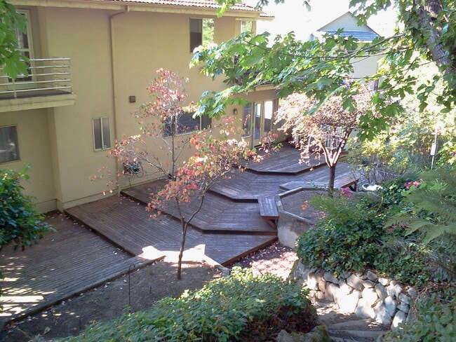 Building Photo - 4+ Bedroom with Great Entertaining Wrap Around Decks with VIEW of PUGET SOUND!!