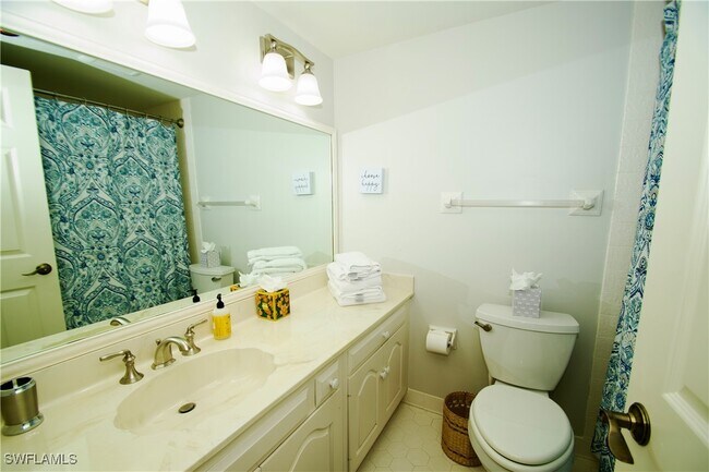 Building Photo - 6075 Pelican Bay Blvd