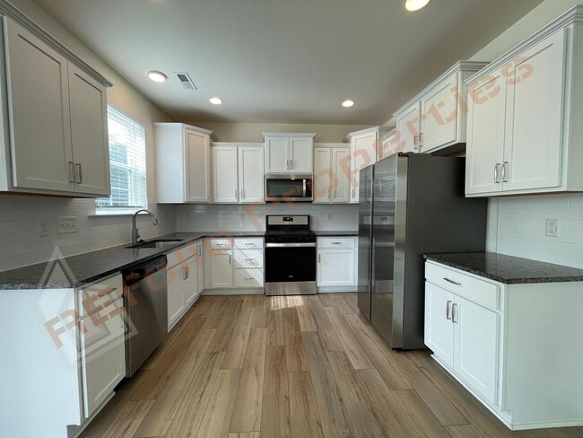 Building Photo - Great news! Application fee will be credit...