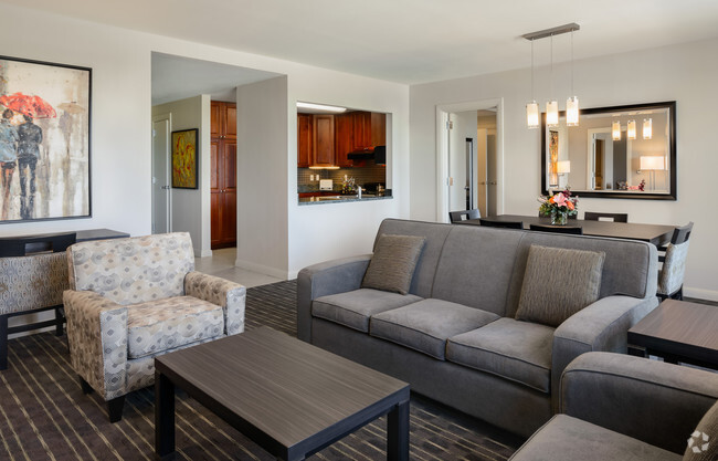 Enjoy our spacious living room. - Broadway Plaza - Mayo Clinic