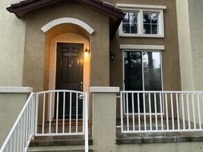 Building Photo - Beautiful Valencia Townhome in the Highly Desirable Village Walk Community