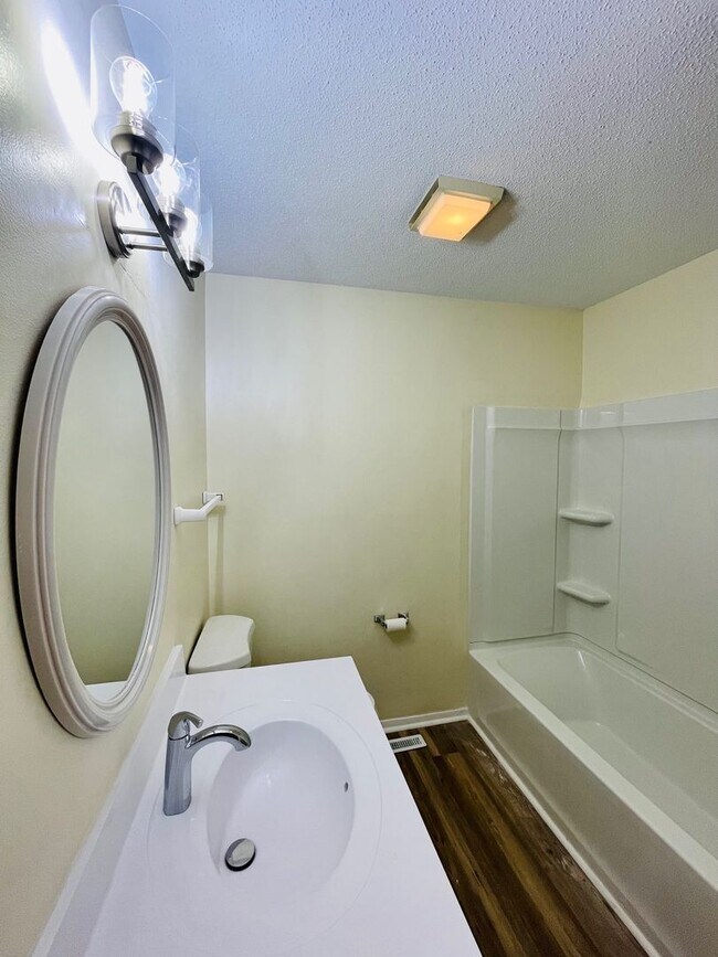 Building Photo - A Beautiful Updated End Unit Townhouse in Coventry, with 2 bedrooms on the first floor. Right nex...