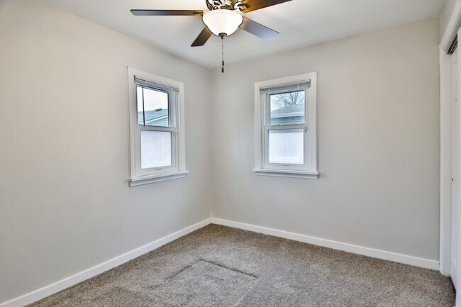 back bedroom, windows facing back yard - 208 Harlem Rd