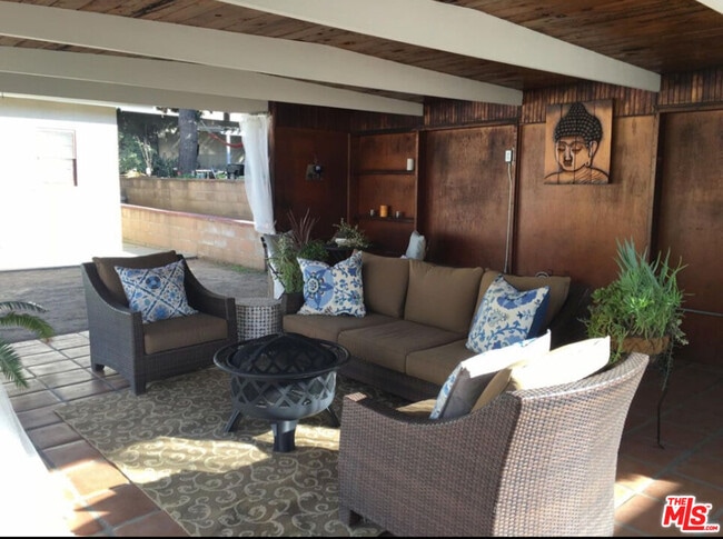 Building Photo - 4922 Genevieve Ave