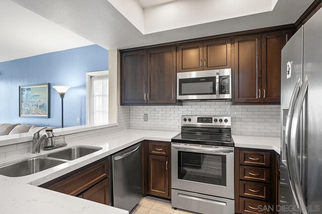 Building Photo - 5865 Friars Rd