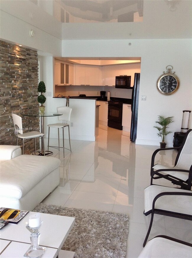Building Photo - 16699 Collins Ave