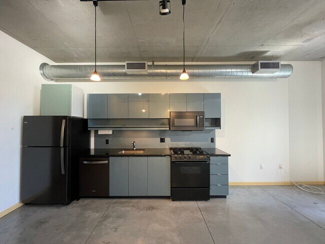 Building Photo - Industrial Highrise Available in the Stree...