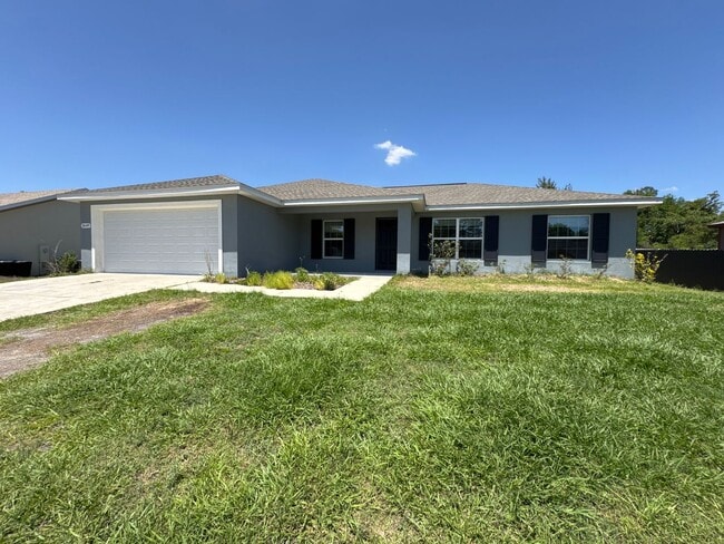 Building Photo - Desirable SW Ocala Neighborhood 4/2/2 *WON'T LAST*