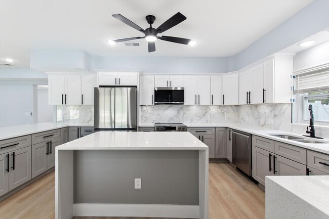 Building Photo - Rare Luxury Lease Opportunity | Spectacular 5-Bedroom Pool Estate on Nearly ¾ Acre Near Gulf Beaches