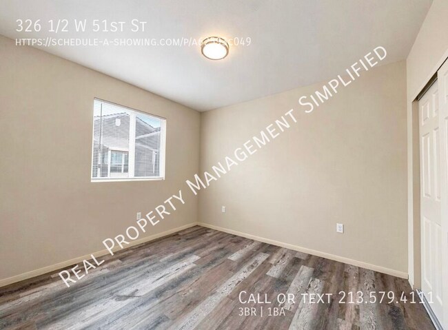 Building Photo - 326 1/2 W 51st St-