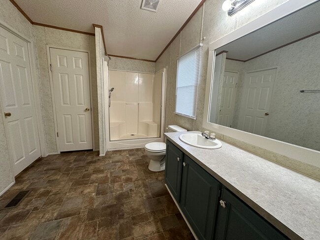 Building Photo - Charm & Commuter Convenience – 3BR/2BA Outside City Limits