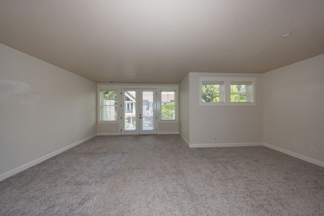 Building Photo - 2 Creeks Condominiums - Gated Community on Camas Meadows Golf Course