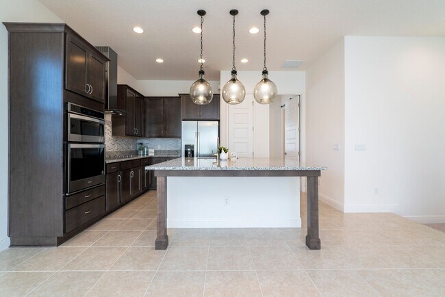 Building Photo - Stunning  MOVE-IN READY TOWNHOME in. Exqui...