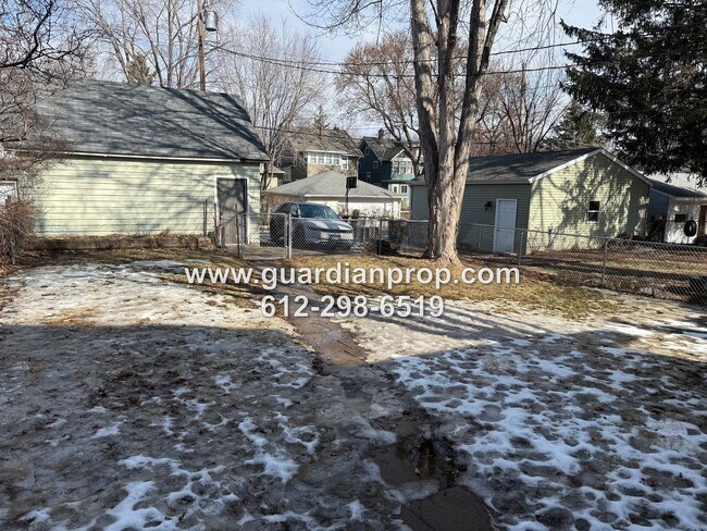 Building Photo - Merriam Park House Available May 1st, Updated Kitchen, Office, Fenced Yard, 2 Car Garage