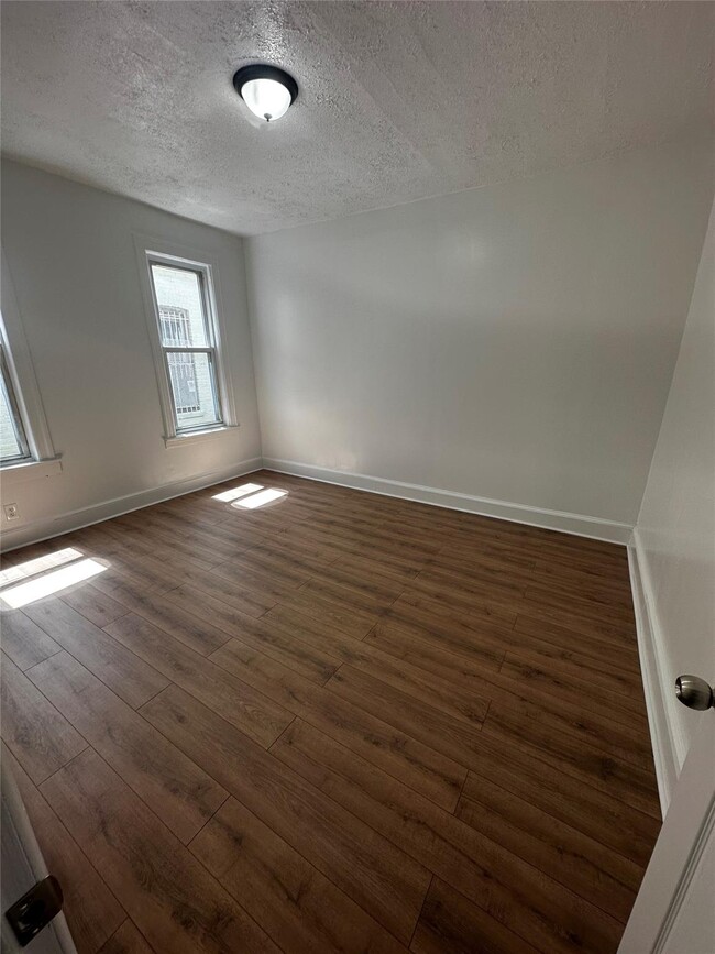 Building Photo - 26-33 96th St