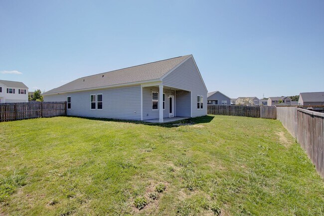 Building Photo - Spacious 4BR Rental with Stunning Kitchen & Covered Patio
